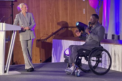 Paralympian, Marcus Perrineau Daley and Sky Sports Presenter, Emma Paton on stage