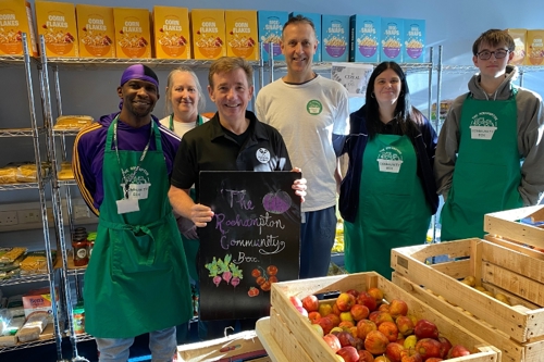 Staff and volunteers support the local community at Rackets Cubed social supermarket project
