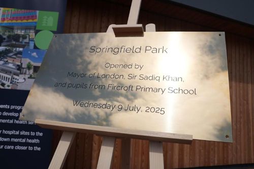 A plaque with the words: Springfield Park opened by Mayor of London, Sir Sadiq Khan and pupils from Fircroft Primary School on Wednesday 9 July, 2025